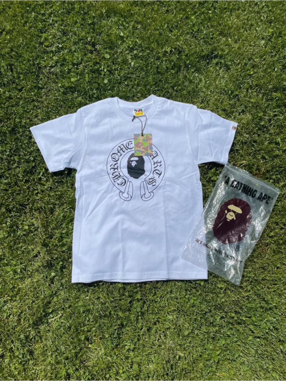 Bape White Tee with Black Graphic and Multicolor Camo Tag